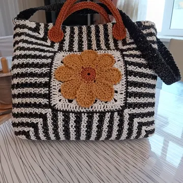 Phone photo of a striped bag